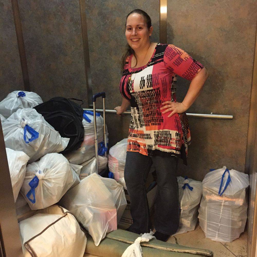 Donation bags and boxes ready for charity after a decluttering session with Kiera Rain, Bay Area Professional Organizer