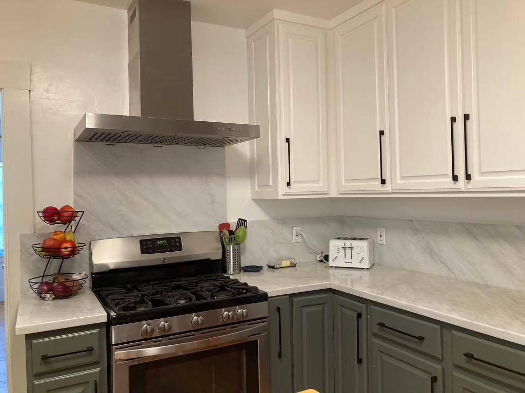 Move-in kitchen organized with two-tone cabinets and marble counters by Kiera Rain, Orinda CA