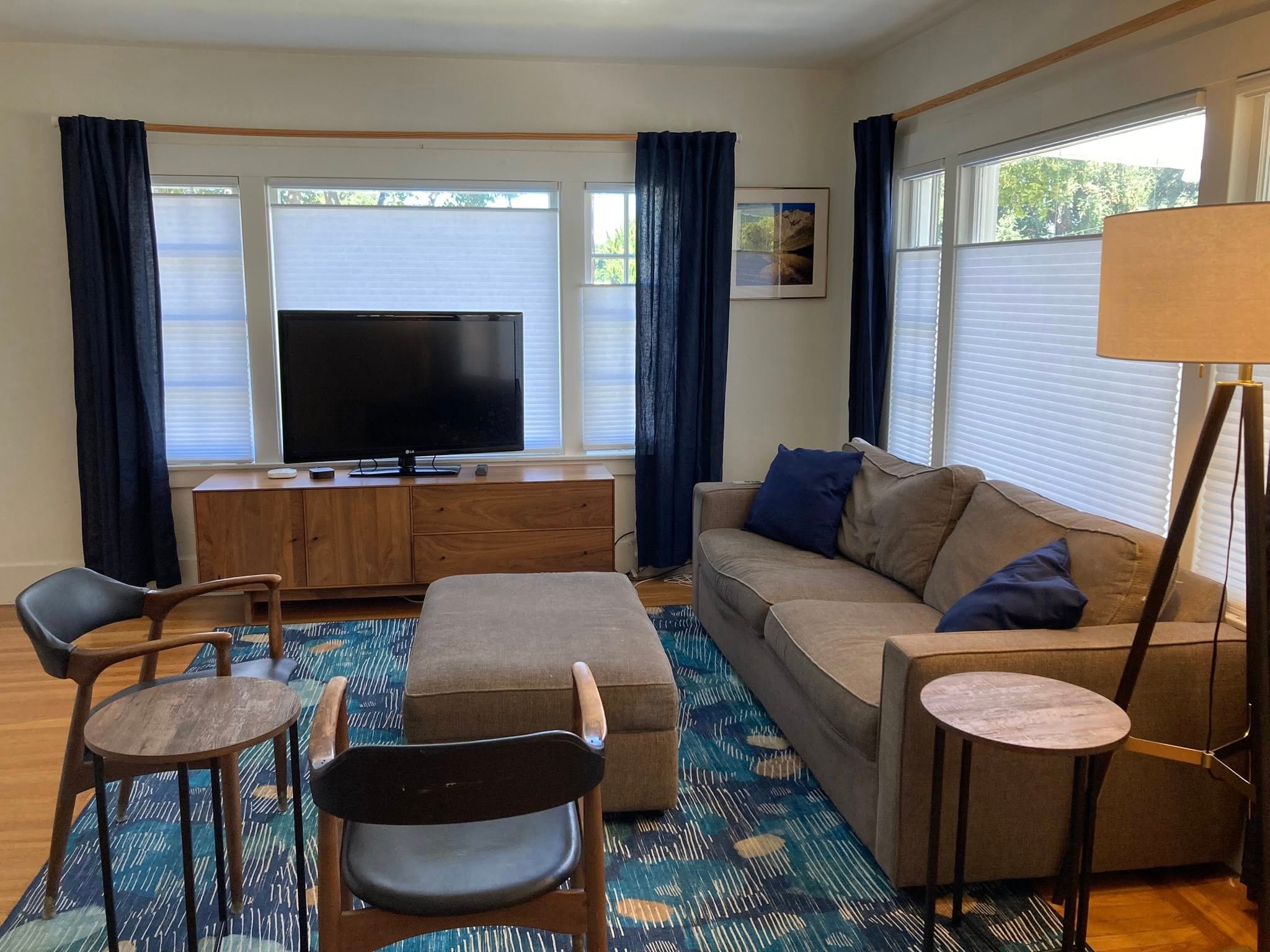 Modern living room with clean organized space by Kiera Rain, Bay Area Professional Organizer, Pleasanton CA