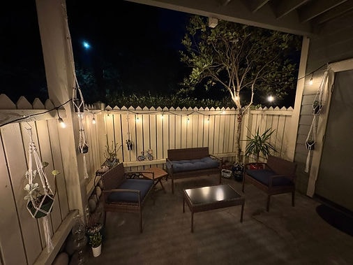 Transformed patio at night with string lights by Kiera Rain, Bay Area Professional Organizer, Danville CA